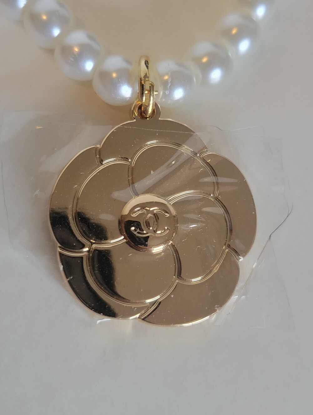 Pearl Necklace with Gold Flower Pendant